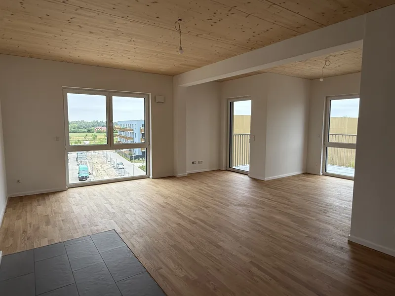 Familiengerechte 4-Zimmer-Neubauwohnung im autofreien Quartier (Erstbezug Oktober 2026) — photo 1